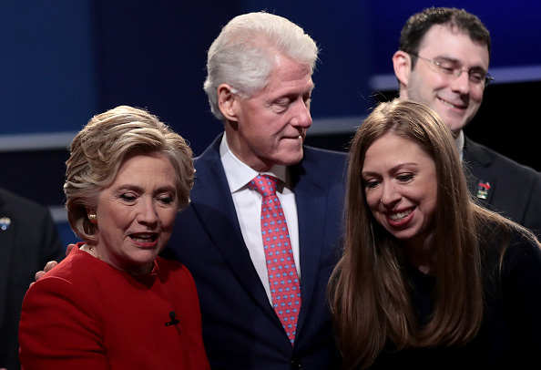 HEMPSTEAD, NY - SEPTEMBER 26: (L-R) Democratic presidential nominee Hillary Clinton looks on with husband and former U.S. President Bill Clinton and daughter, Chelsea Clinton after the Presidential Debate with Republican presidential nominee Donald Trump at Hofstra University on September 26, 2016 in Hempstead, New York. The first of four debates for the 2016 Election, three Presidential and one Vice Presidential, is moderated by NBC's Lester Holt. (Photo by Drew Angerer/Getty Images)