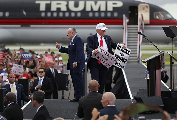 LAKELAND, FL - OCTOBER 12: Republican presidential candidate Donald Trump and former New York City mayor Rudy Giuliani campaign together during a rally at the Lakeland Linder Regional Airport on October 12, 2016 in Lakeland, Florida. Trump continues to campaign against Democratic presidential candidate Hillary Clinton with less than one month to Election Day. (Photo by Joe Raedle/Getty Images)