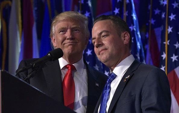 Chairman of the Republican National Committee (RNC) Reince Priebus (R) hugs Republican presidential elect Donald Trump during election night event at the New York Hilton Midtown in New York on November 9, 2016. / AFP / MANDEL NGAN (Photo credit should read MANDEL NGAN/AFP/Getty Images)